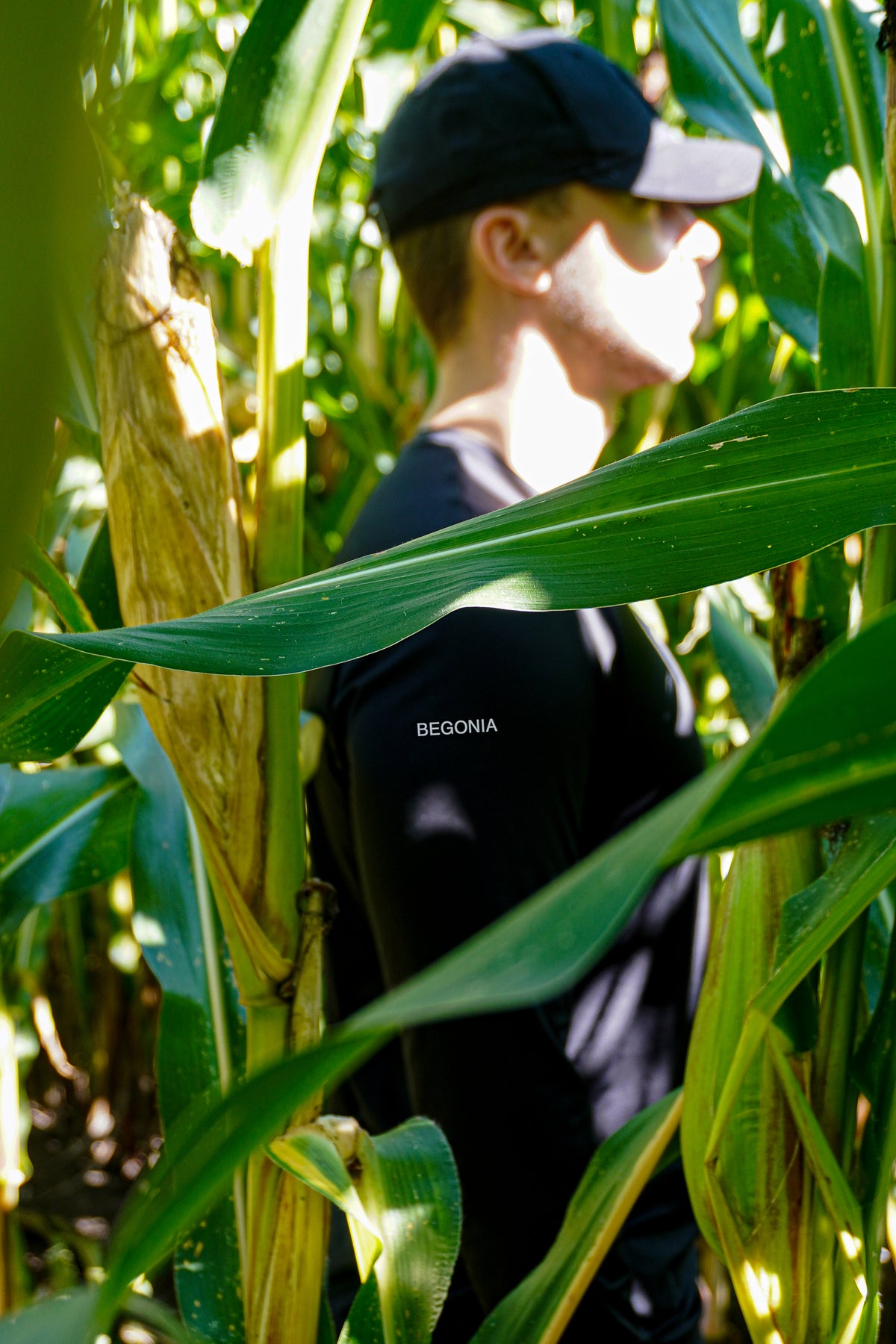 Model wearing the black seamless long sleeve tee outdoors