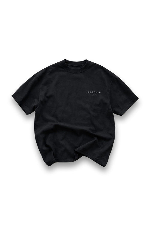 Black oversized tee, front, with small BEGONIA chest logo