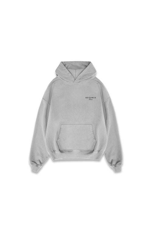 Grey oversized hoodie, front, with small BEGONIA chest logo